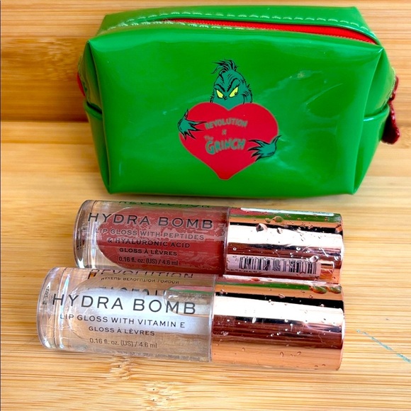 Brand New Revolution Set of 2 Hydra Bomb Lip Gloss & Grinch Green Zippered Bag - Picture 1 of 13